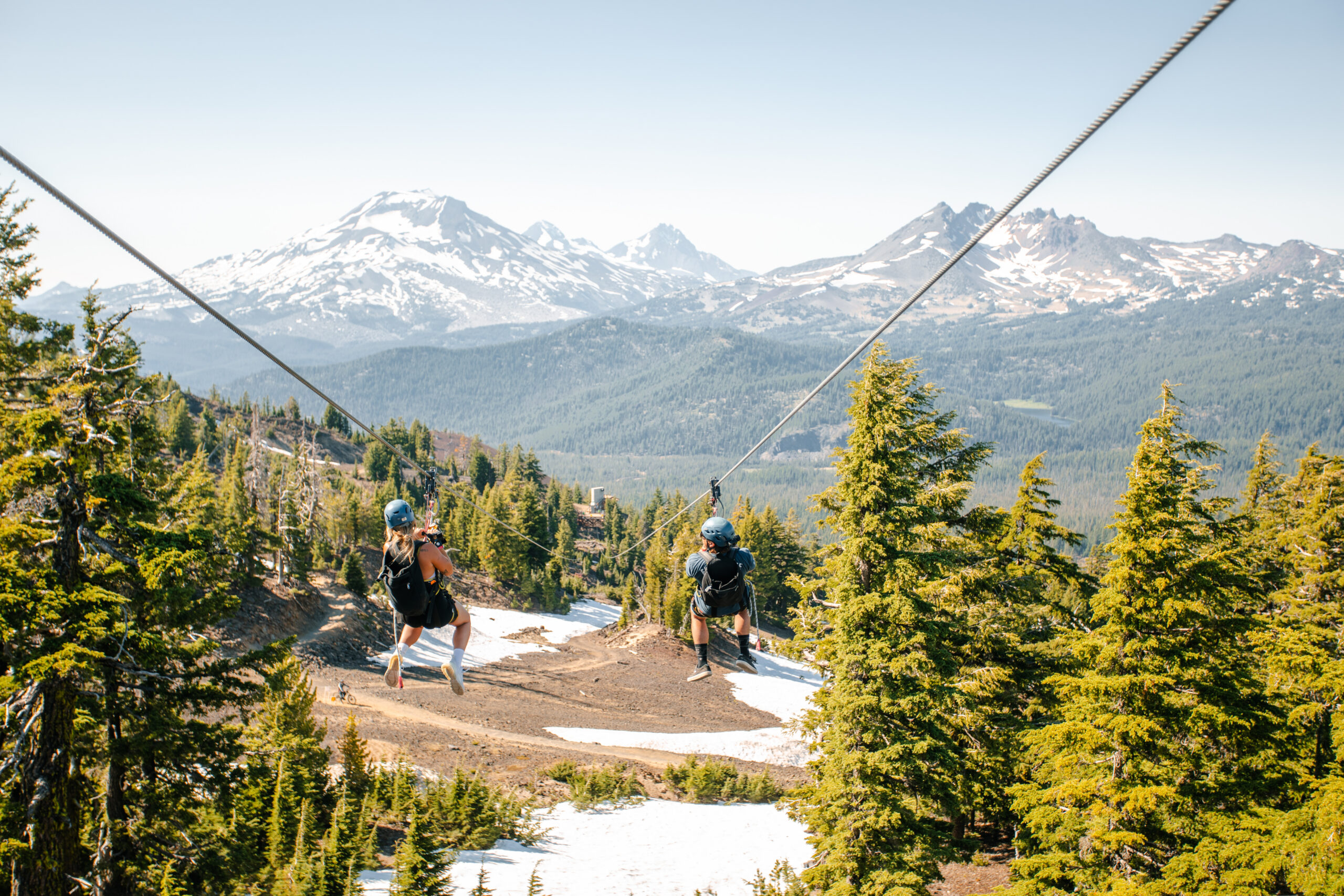 Couple doing zipline at Mt. Bachelor